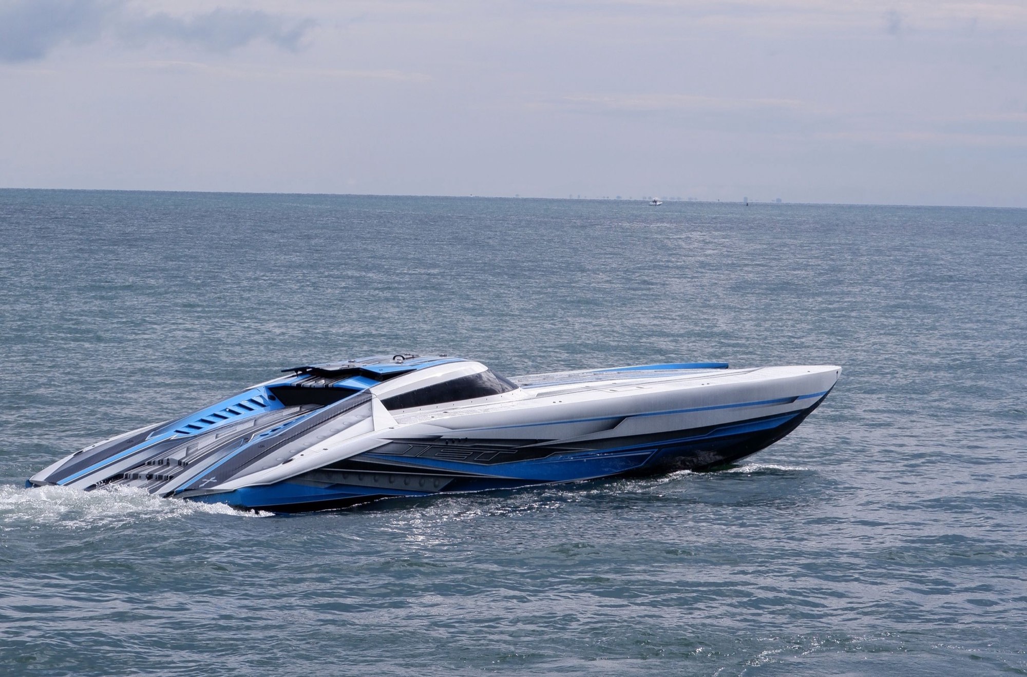 Offshore catamaran at speed on open water
